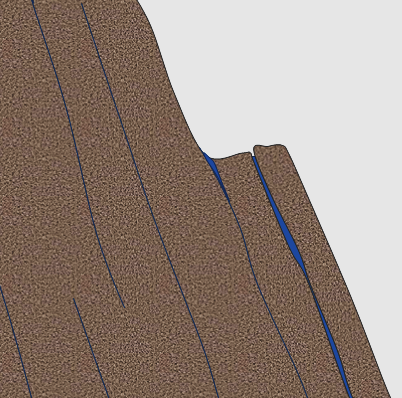 The process of frost wedging on a steep slope. Water gets into fractures and then freezes, expanding the fracture a little. When the water thaws it seeps a little farther into the expanded crack. The process is repeated many times, and eventually a piece of rock will be wedged away.