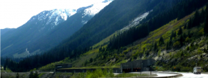 Figure 15.21 A snow avalanche shelter on the Coquihalla Highway. The expected path of the avalanche is the steep un-treed slope above. [SE]