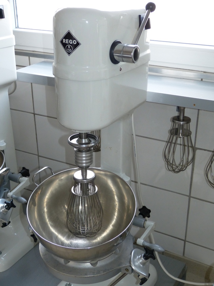 image of a large white mixer with a wisk