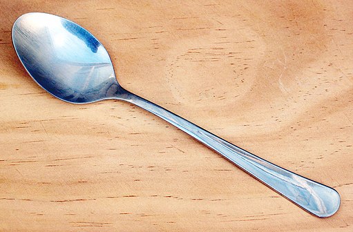 image of a solid metal spoon