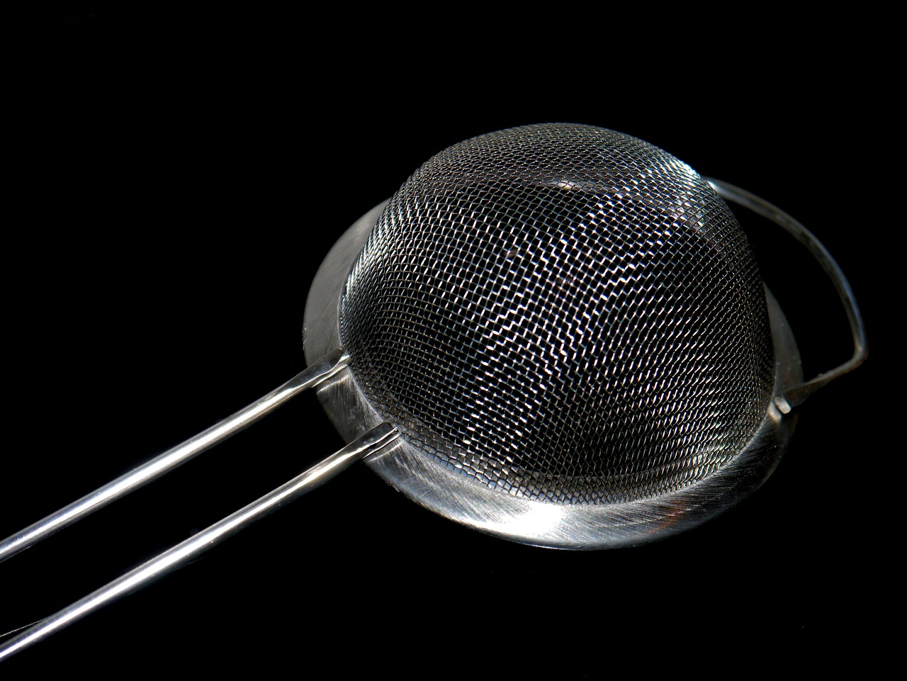 image of a metal, wire mesh strainer