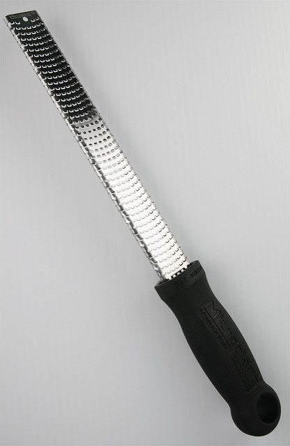 image of a zester, a smaller version of a grater that is used to zest fruit