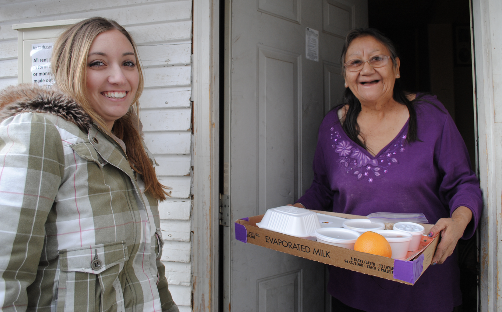 Delivery of Thanksgiving dinner to a Meals on Wheels recipient in Montana, U.S. (2011)