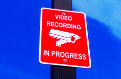 A sign that says: video recording in progress