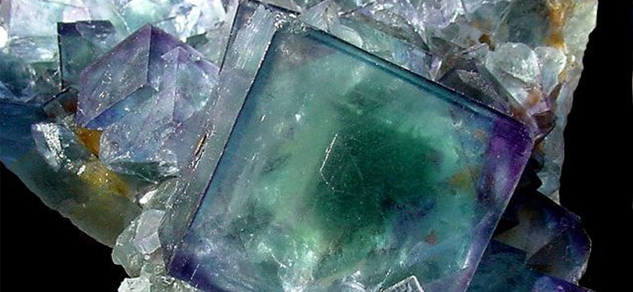 The cover picture for the chapter 15 introduction, displaying fluorite ( C a F sub 2 )