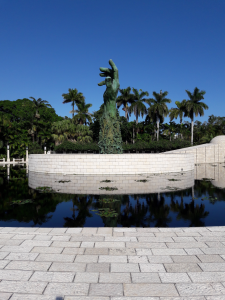 Holocaust Memorial: Miami Beach, Florida. Large bronze sculpture of an arm covered with bronze figures climbing upward.