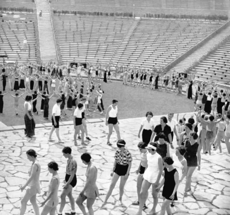 Photo shows people rehearsing for the Olympic Games ceremonies.