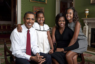 Photo showing the Obama family (right to left: Barack, Sasha, Michelle, and Malia).