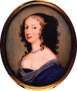 Oval-shaped portrait of Margaret Cavendish, a fair-skinned woman with dark, curly hair. She faces the viewer’s left and looks at them directly. She wears a blue dress that hangs from her shoulders, as well as a silvery necklace tight around her neck.