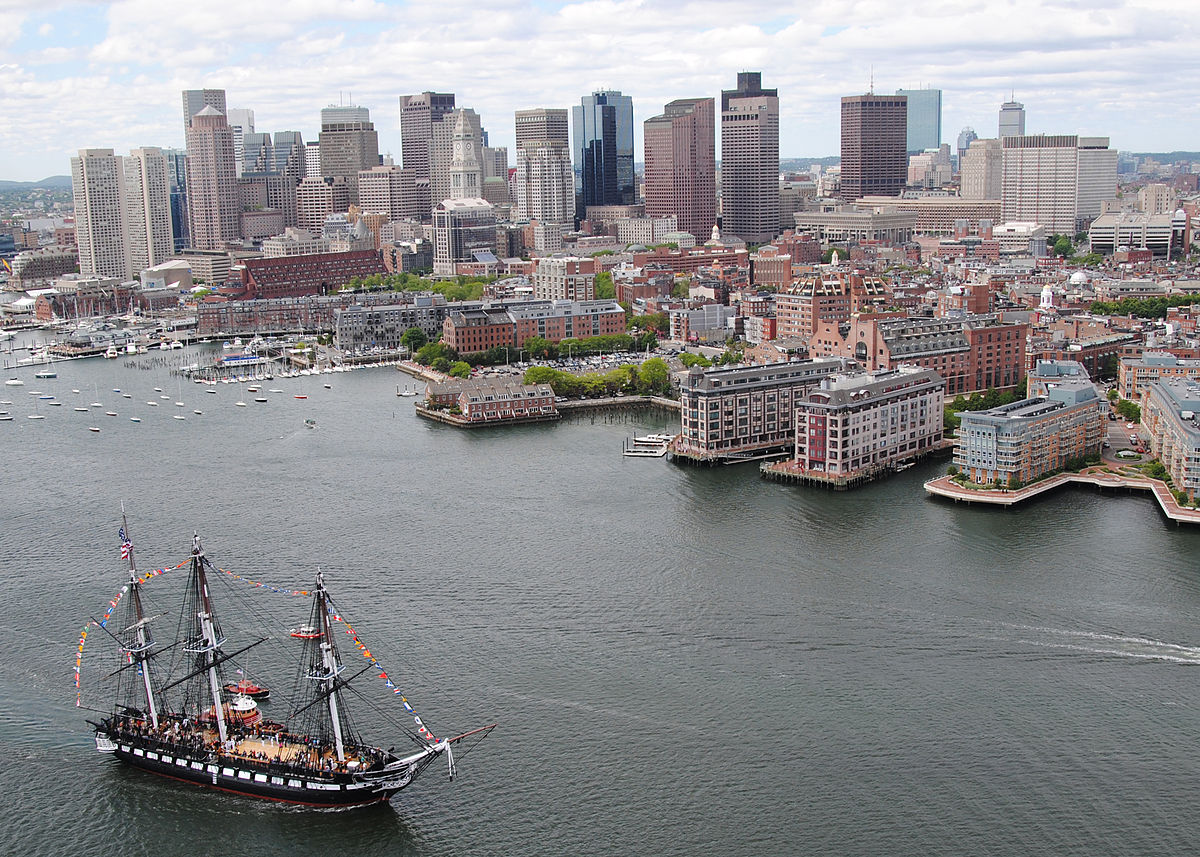 Boston Harbor with big sail boat in water