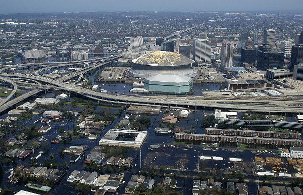 Image of the New Orleans super dome surrounded by a flooded city after Hurricane Katrina