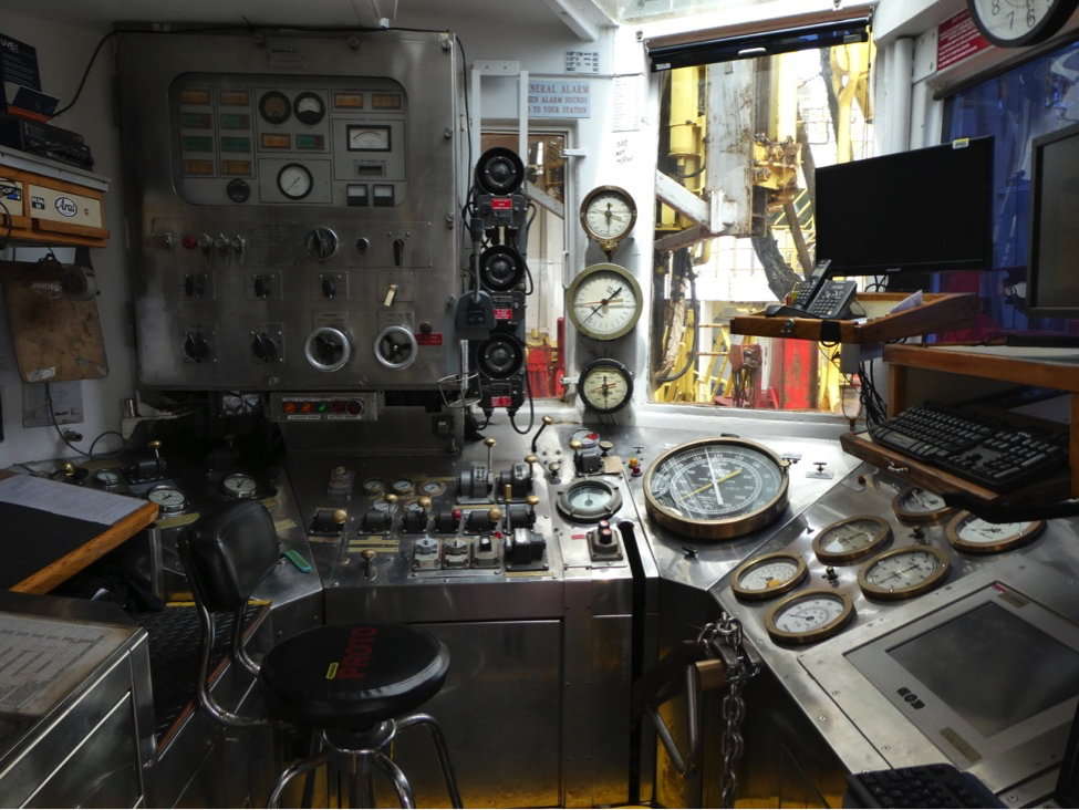 Room with lots of dials and a window to outside