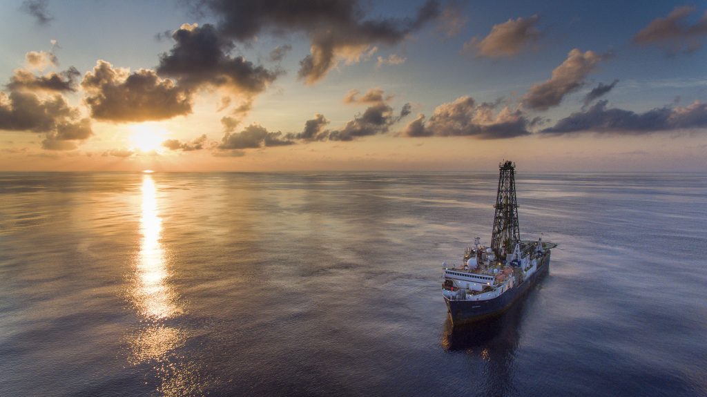 ship on the ocean at sunset