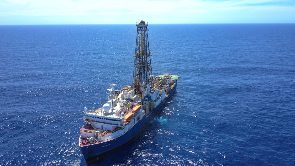 drilling ship on the ocean during daytime