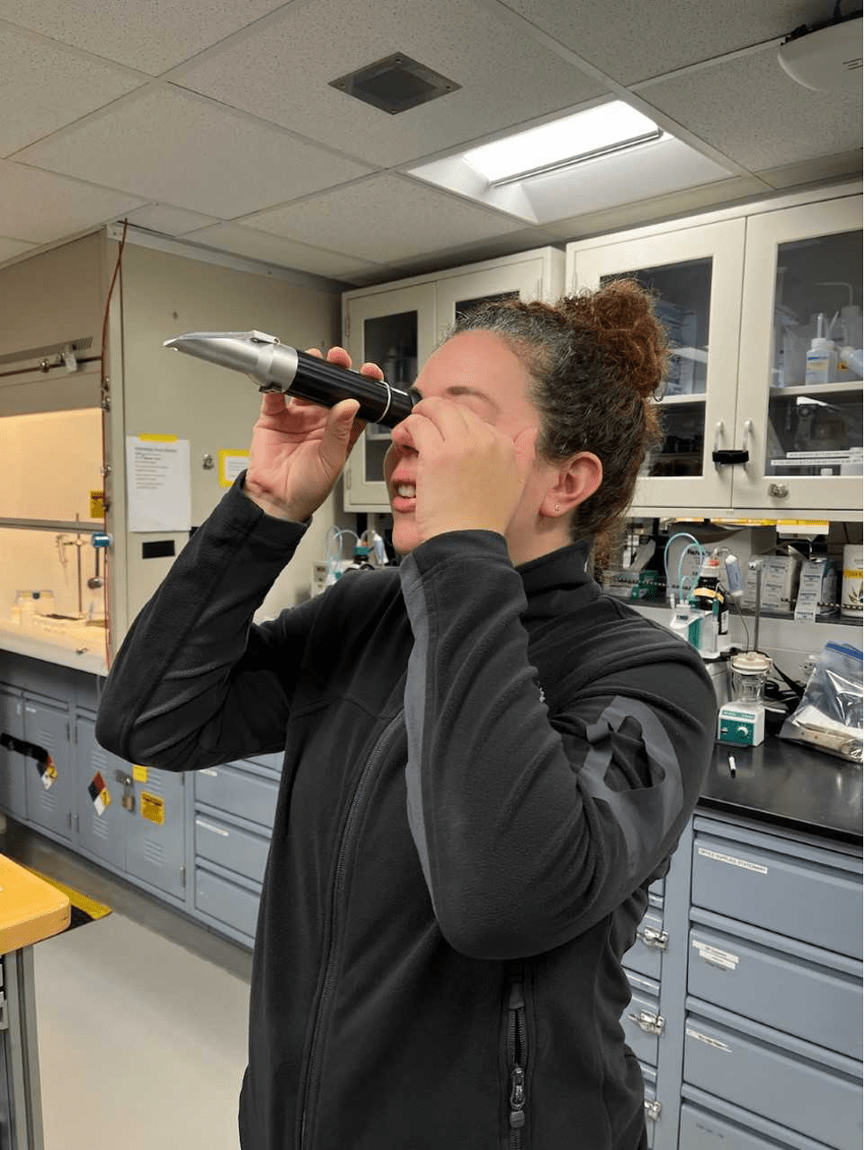 Danielle checking the salinity of interstitial water.